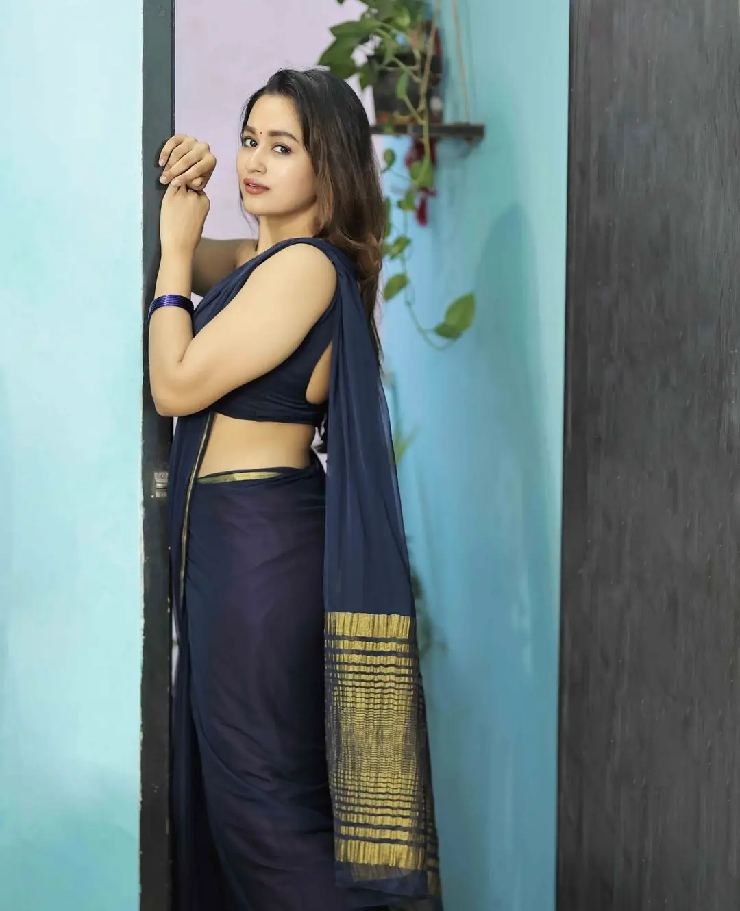 Tamil TV Actress Kaavya Arivumani in Blue Saree Sleeveless Blouse